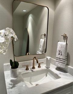 Elegant Champagne Bronze Bathroom Fixtures and Mirror