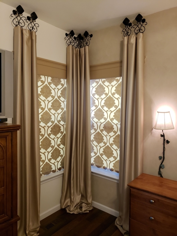 Elegant Drapery Hardware with Patterned Pull-Down Shades