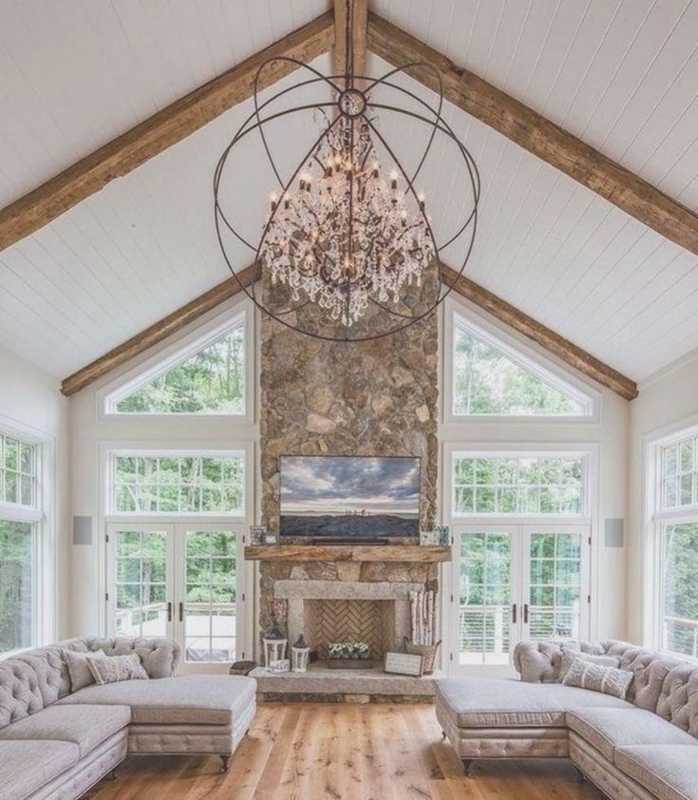 Elegant Living Room with Exposed Beam Ceiling and Chandelier