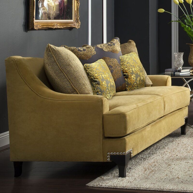 Elegant Mustard Velvet Sofa with Decorative Cushions