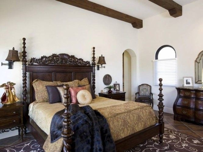 Elegant Spanish Style Bedroom with Dark Wood Furnishings