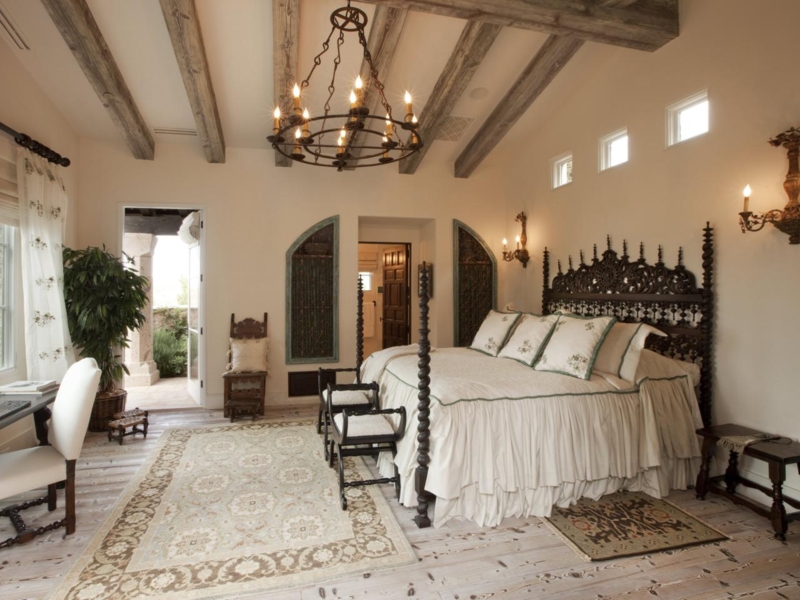 Elegant Spanish Style Bedroom with Rustic Beams