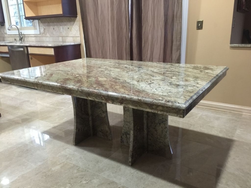 Exotic Granite Dining Table with Sculpted Bases