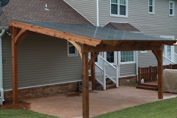 Free standing pergola with polycarbonate roof panels to keep out the ...