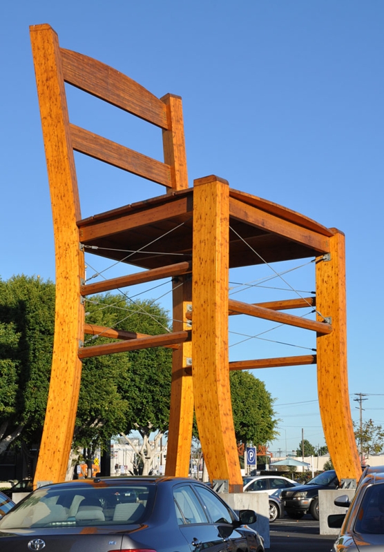 Gigantic Wooden Chair Sculpture in Urban Setting
