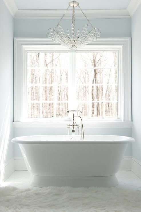 Glass Bubbles Chandelier over Roll Top Bathtub in Transitional Bathroom