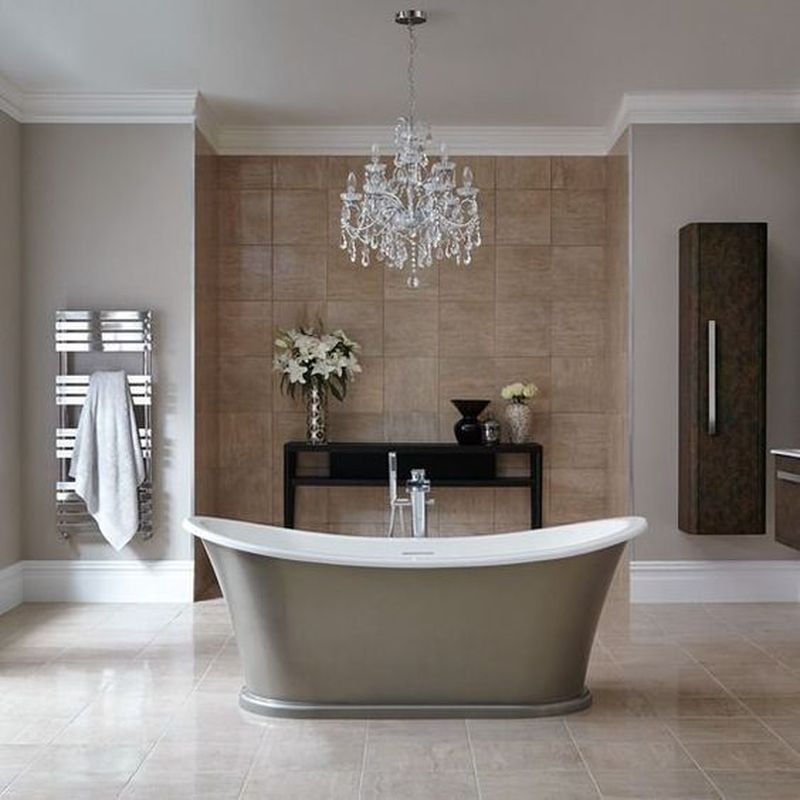 Luxury Bathroom with Freestanding Tub and Crystal Chandelier