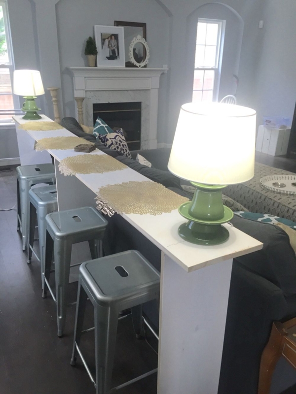 Modern Bar Table Behind Sofa with Metal Stools