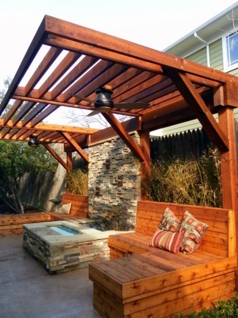 Modern Cantilever Pergola with Stone Fireplace