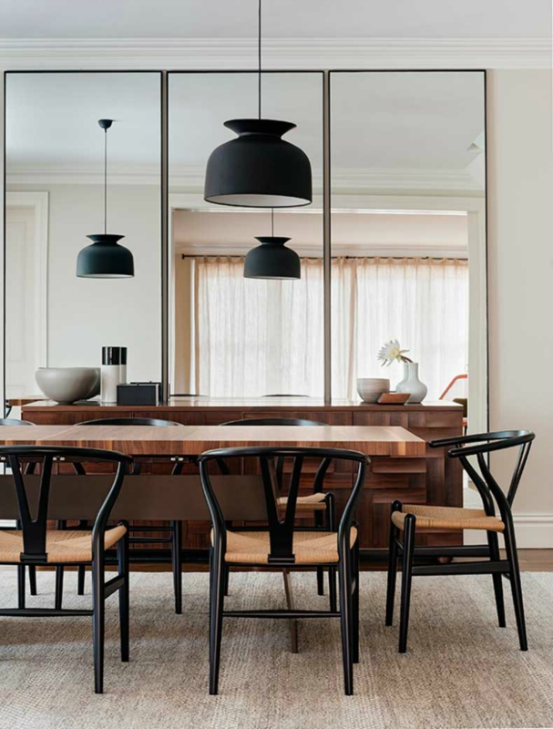 Modern Dining Room with Large Wall Mirrors