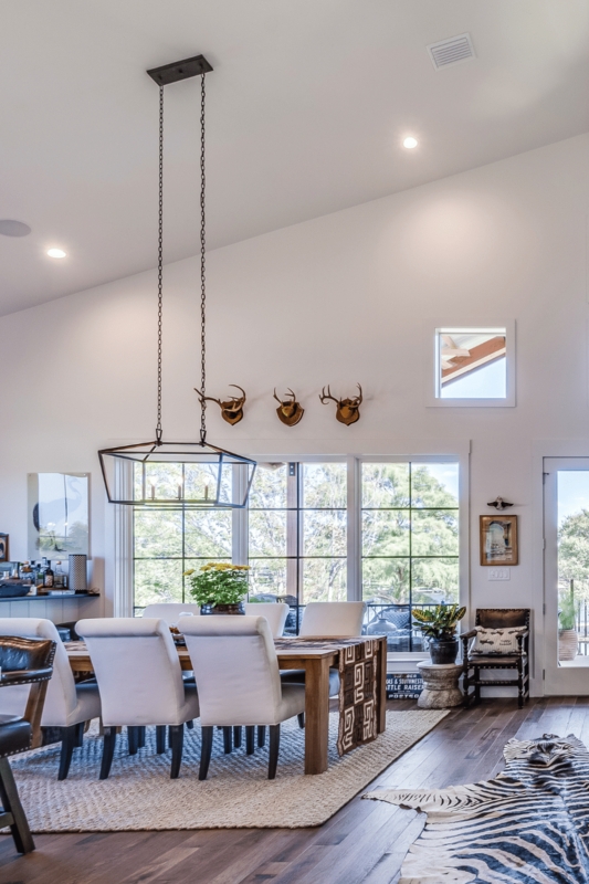 Modern Dining Room with Vaulted Ceiling and Natural Light