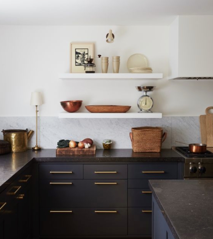 Modern Kitchen with Dark Cabinets and Accent Lighting