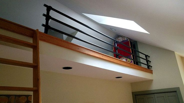 Modern Loft Railing with Wood and Metal Accents