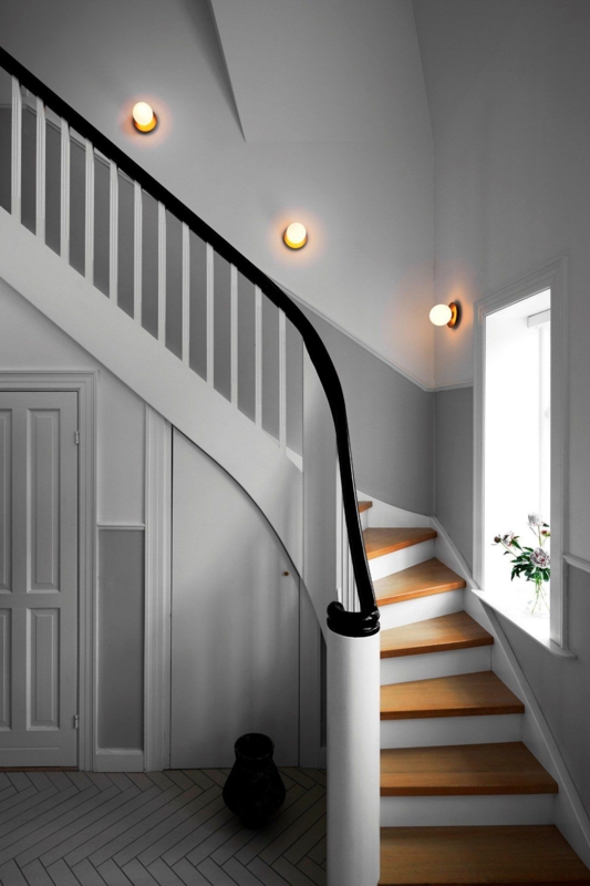 Modern Staircase with Minimalist Wall Sconces