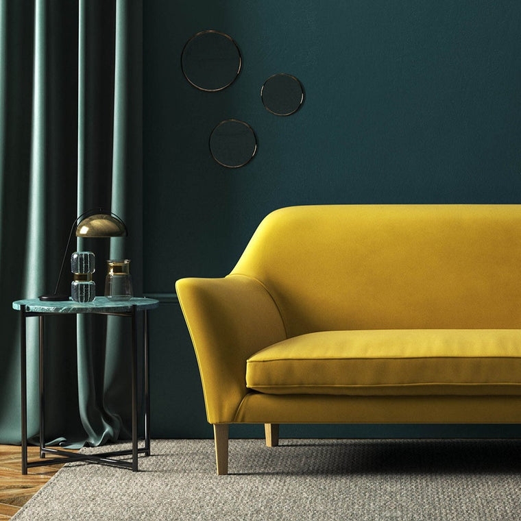 Mustard Yellow Velvet Sofa with Dark Wall