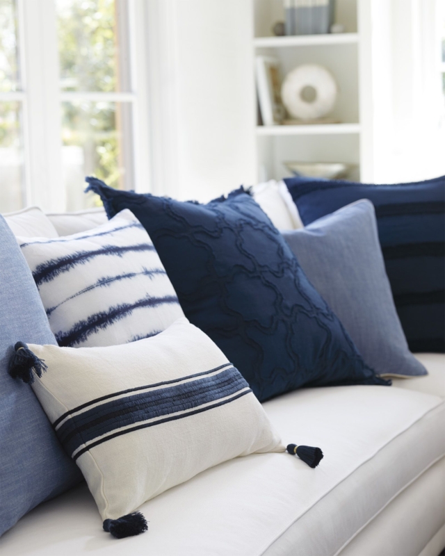 Navy Blue Couch with Mixed Pattern Throw Pillows