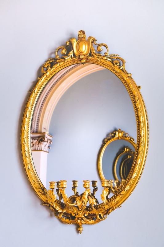 Ornate Vintage Gold Mirror with Candle Holder