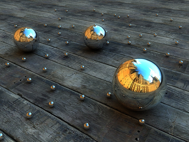 Reflective Mirror Spheres on Rustic Wood Floor
