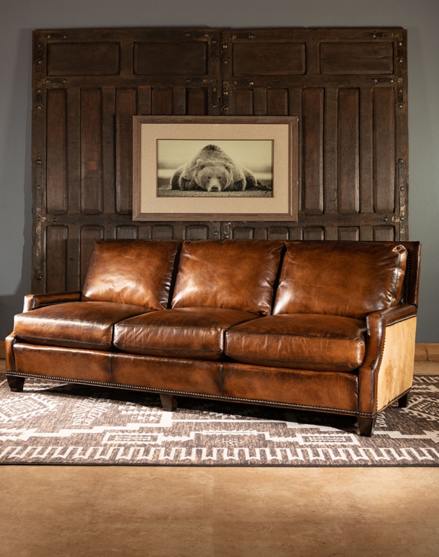 Rustic Brown Leather Sofa with Vintage Charm