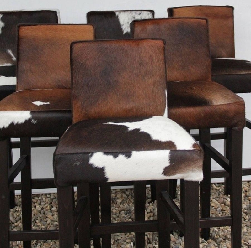 Rustic Cowhide Bar Stools with Dark Wood Legs