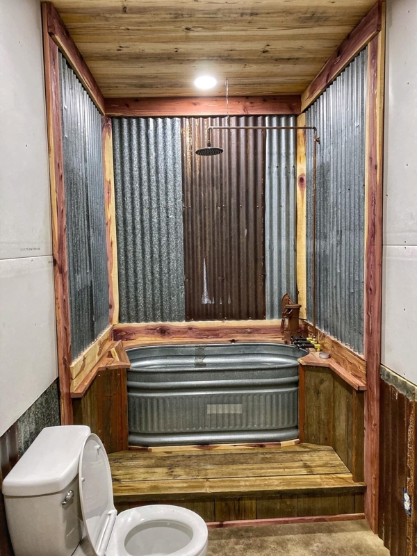 Rustic Outdoor Bathroom with Corrugated Metal Walls