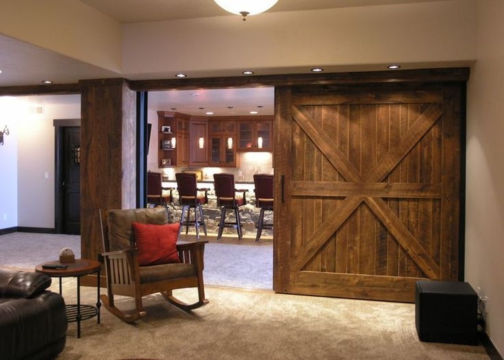 Rustic Sliding Barn Door Connecting Living and Kitchen