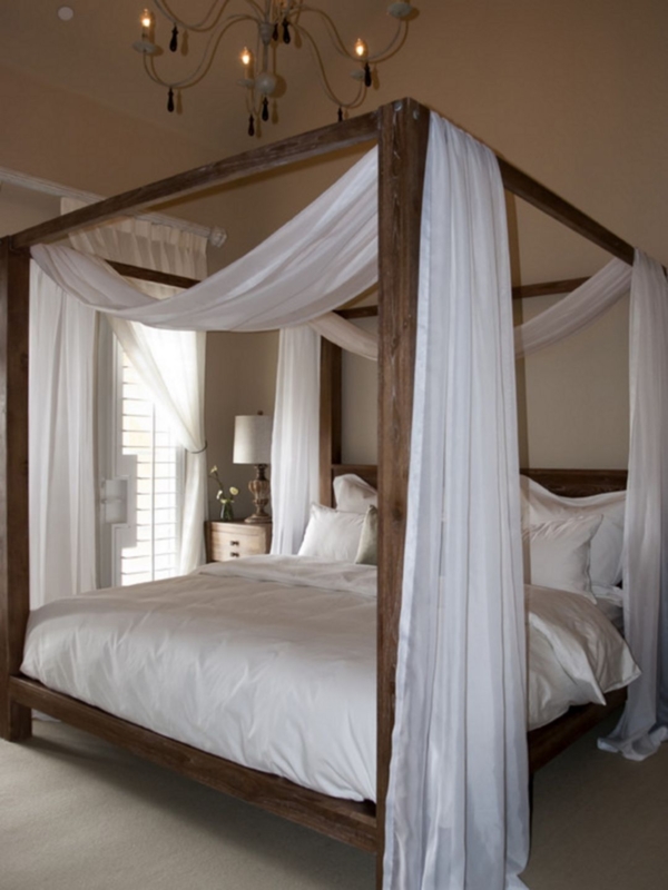 Rustic Wooden Canopy Bed with White Drapes