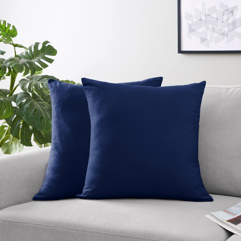 Solid Navy Blue Throw Pillows on Light Sofa