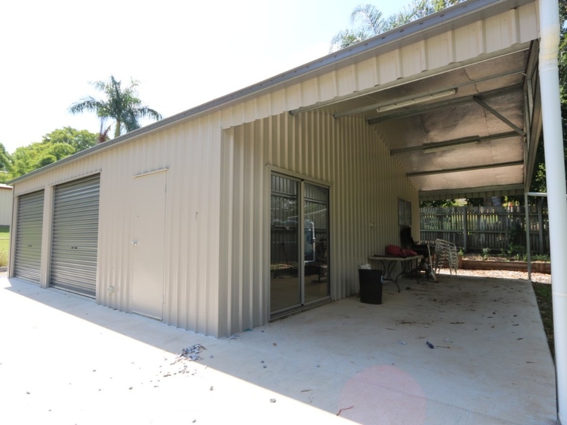Spacious 12x9 Meter Shed with Awning and Yard