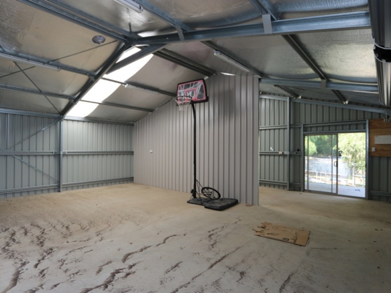 Spacious 12x9 Meter Shed with Natural Light and Ventilation