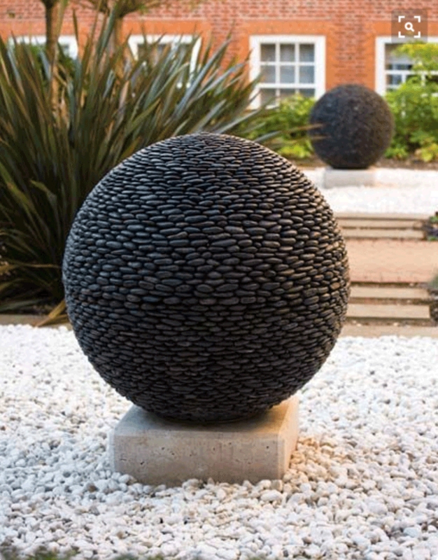 Textured Concrete Garden Spheres for Modern Landscaping