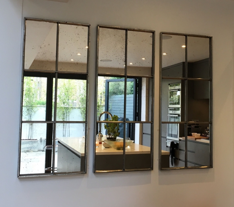Trio of Architectural Mirror Panels in Dining Room