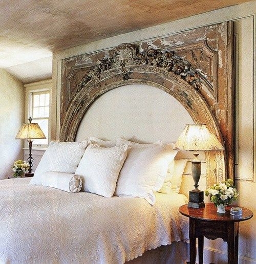 Vintage Carved Arch Headboard in Cozy Bedroom