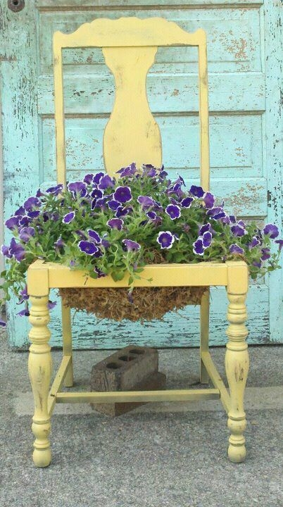 Vintage Yellow Chair Planter with Purple Flowers