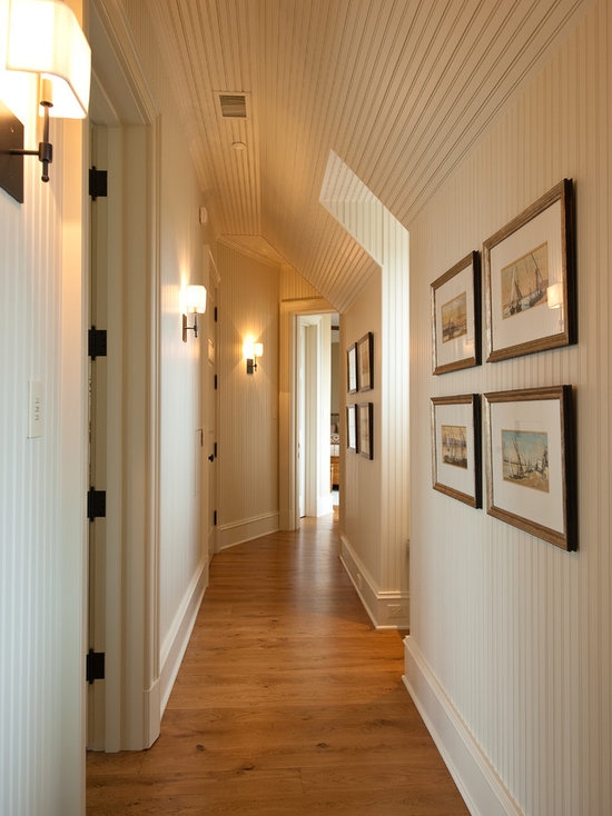 Warm Wooden Hallway with Classic Wall Sconces
