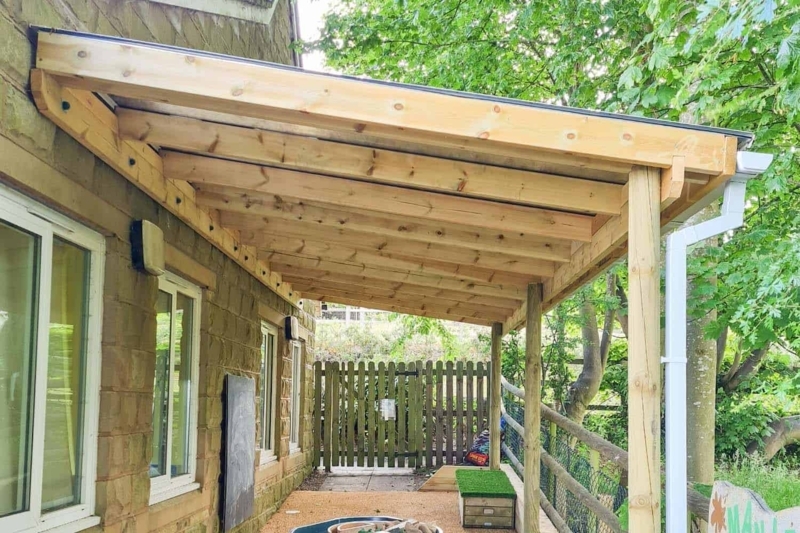 Wooden Pergola with Clear Polycarbonate Roof Design