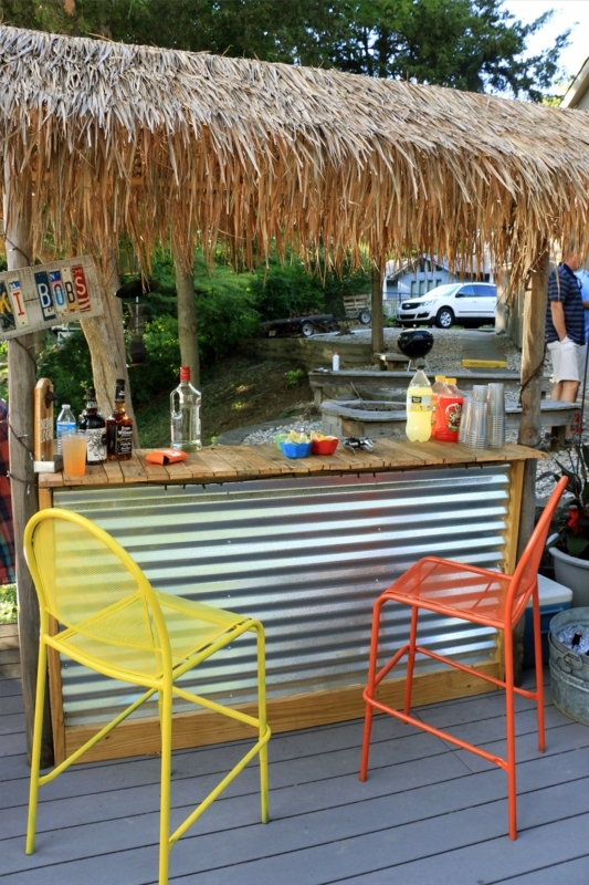Affordable Backyard Tiki Bar with Colorful Seating