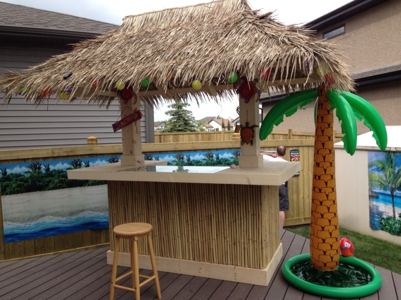 Backyard Tiki Bar with Tropical Decor and Pool