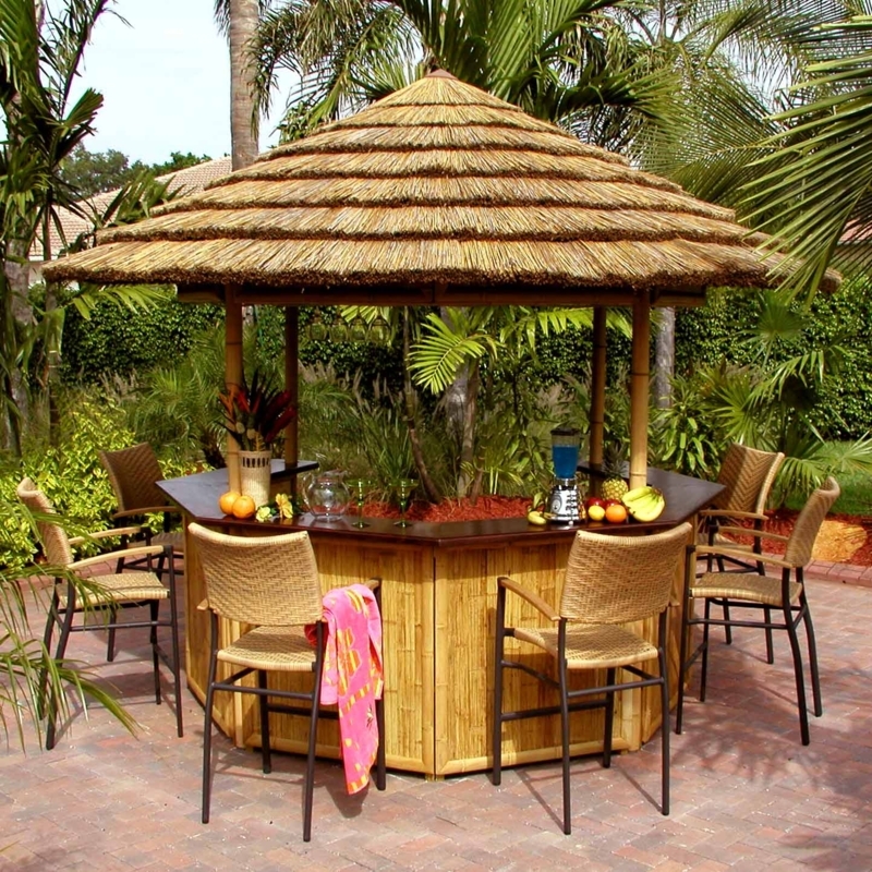 Charming Backyard Tiki Bar with Bamboo and Thatch Roof