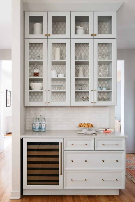 Chic Kitchen Cabinets with Patterned Wallpaper Backing