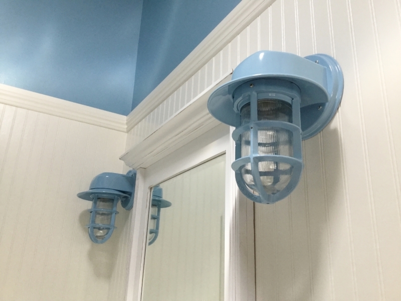 Coastal Blue Nautical Wall Sconces in Bathroom