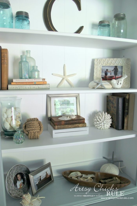 Coastal Style Bookshelves with Beach Decor Accents