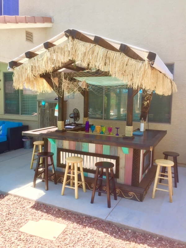 Colorful DIY Backyard Tiki Bar with Thatch Roof