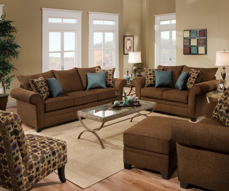 Cozy Living Room with Dark Brown Sofas and Patterned Accents