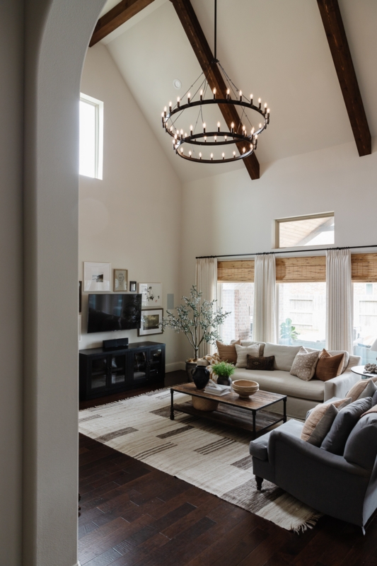 Cozy Living Room with Vaulted Ceilings and Chandelier