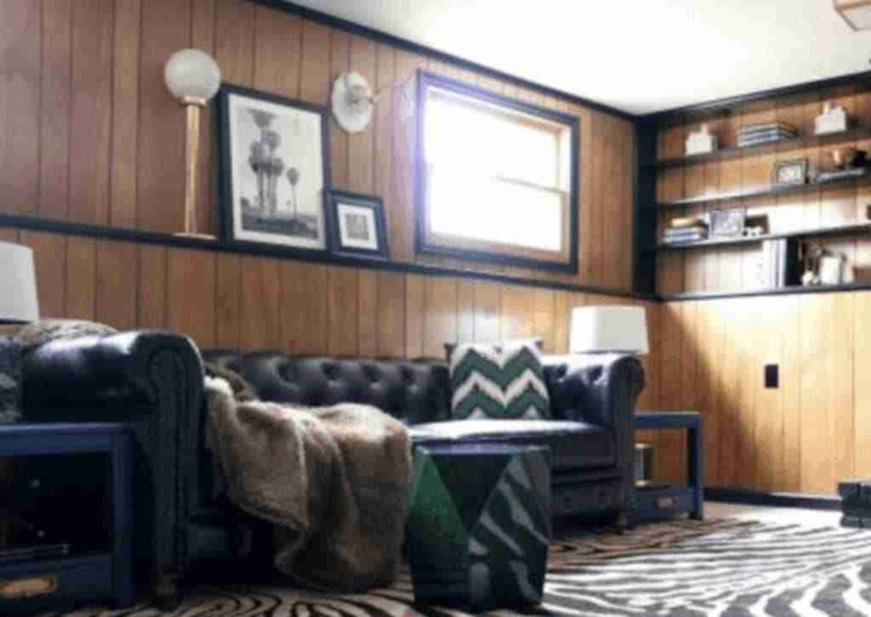 Cozy Living Room with Wood Paneling in Mobile Homes