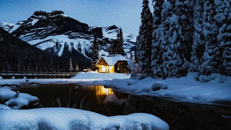 Cozy Mountain Cabin in Snowy Winter Landscape