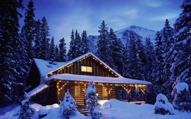Cozy Mountain Cabin with Winter Snow and Lights