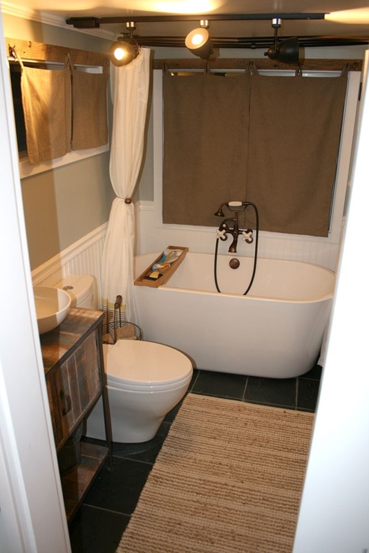 Cozy Tiny House Bathroom with Freestanding Tub