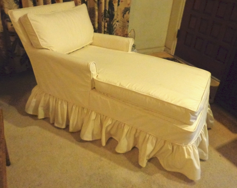 Cream Slipcovered Chaise Lounge with Ruffled Skirt